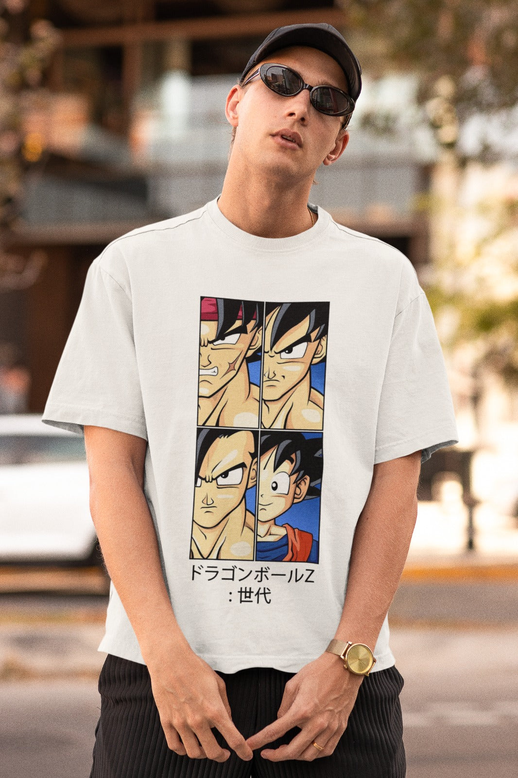 Celebrate Kakarot's family legacy with our white unisex oversized t-shirt featuring Bardock, Goku, Gohan, and Goten. Their half faces represent four generations of Dragon Ball heroes. "Dragon Ball: Generations" is beautifully written in Japanese characters for authenticity. Crafted for style and comfort, this trendy tee is a must-have for Dragon Ball fans. Honor the Saiyan lineage and elevate your wardrobe with this powerful design today!