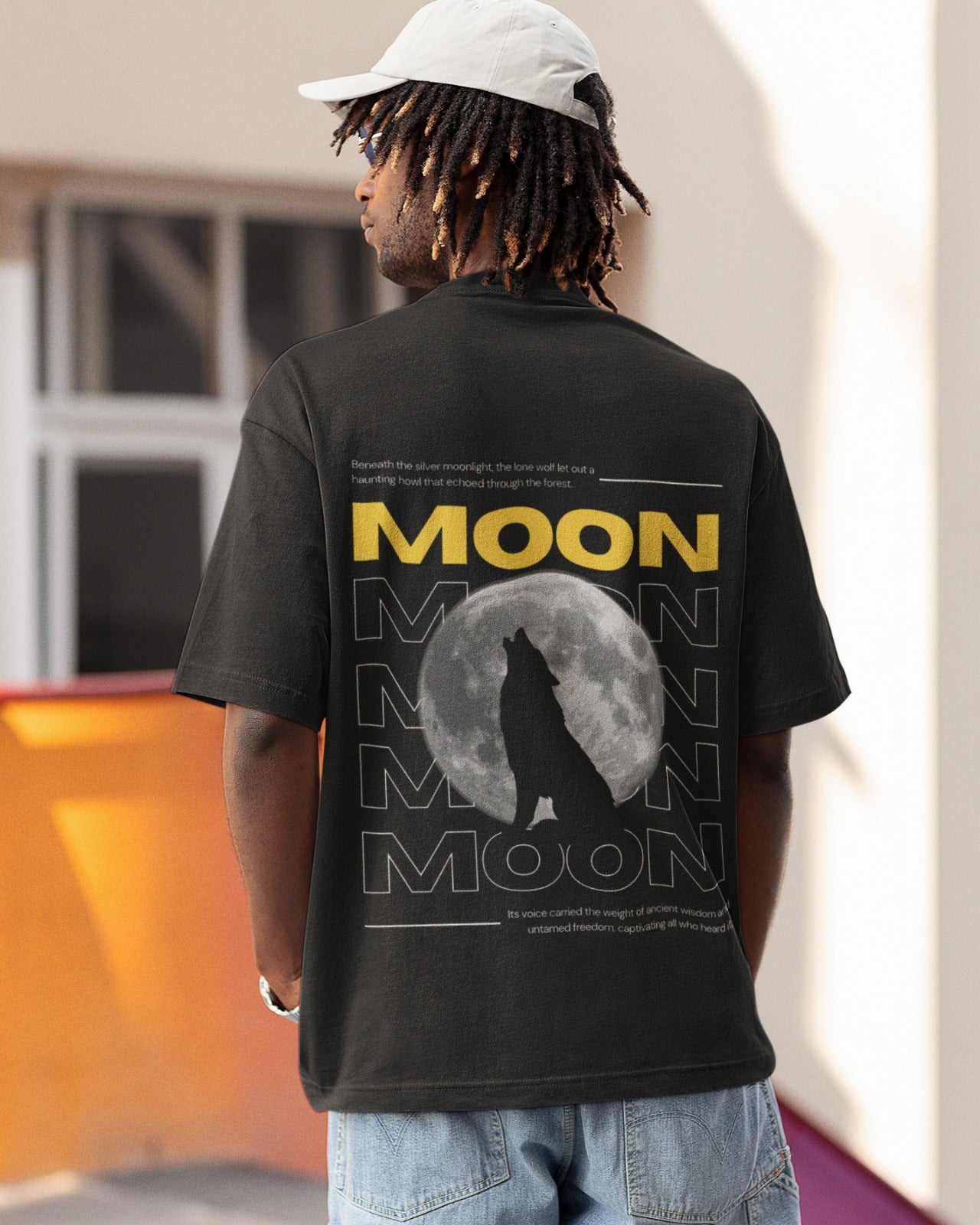 Elevate your style with our Premium Black Oversized T-Shirt, featuring a captivating graphic design on the back: a full moon, a howling wolf silhouette, and the bold word MOON. Above, a poetic message reads, "Beneath the silver moonlight, the lone wolf let out a haunting howl that echoed through the forest." Below, "Its voice carried the weight of ancient wisdom and untamed freedom, captivating all who heard it." Crafted meticulously, Order now and let your inner wolf howl with style.
