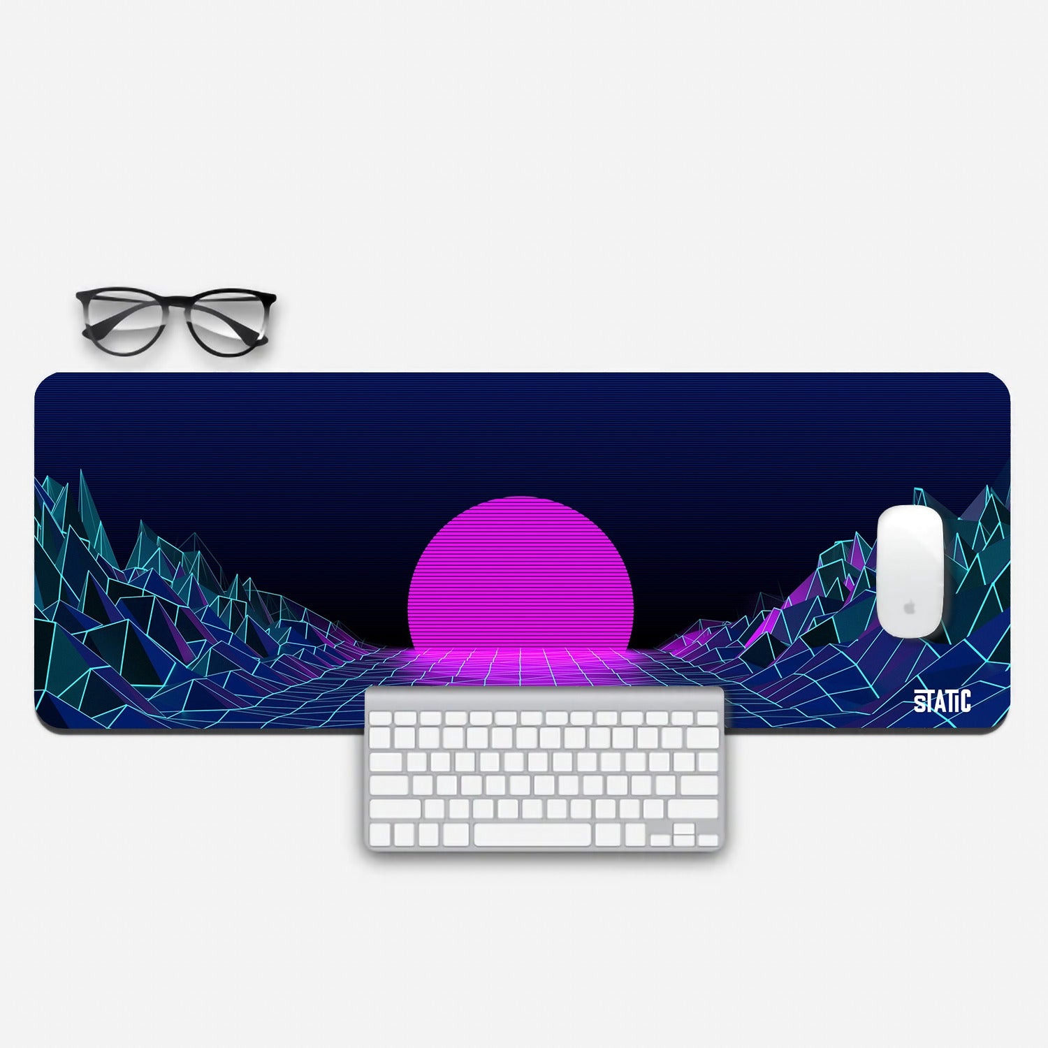 Transform your gaming space with our Extended Gaming Mouse Pad featuring a stunning digital image of a retro-style neon valley. This unique design combines the charm of a bygone era with modern gaming functionality. The vibrant pink sun rising amidst neon shapes adds a captivating touch to your setup. Enjoy precise control and a skid-proof surface for your peripherals. Elevate your gaming experience with this eye-catching accessory. Experience nostalgia and precision in one stylish package.