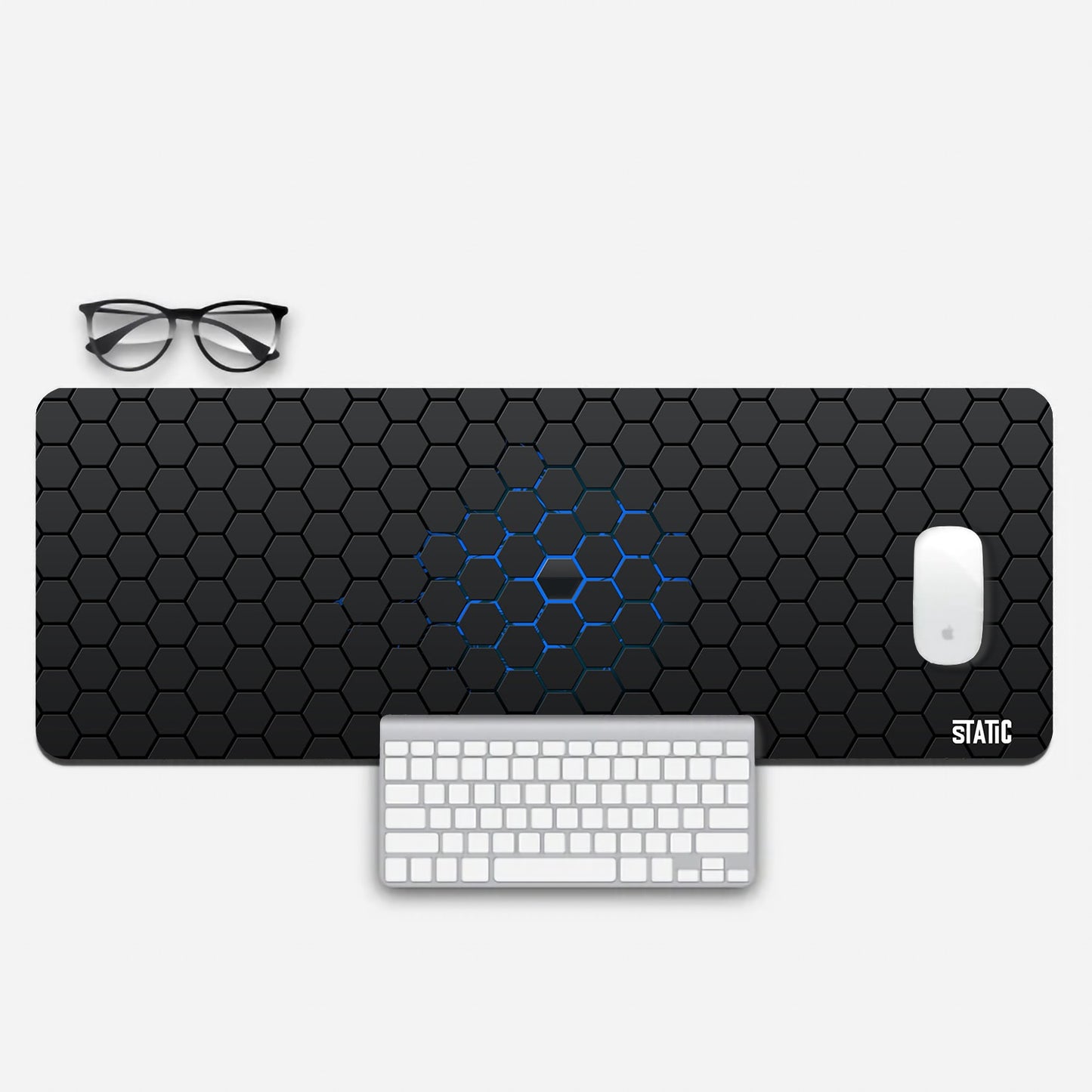 Elevate your gaming experience with our Extended Gaming Mouse Pad! Immerse yourself in a mesmerizing world of hexagonal tiles, each strategically placed with a subtle gap, allowing a captivating blue light to shine through from beneath. This meticulously designed pad enhances both aesthetics and performance, offering precision and style for your gaming setup. Upgrade your gear and immerse yourself in the game like never before.