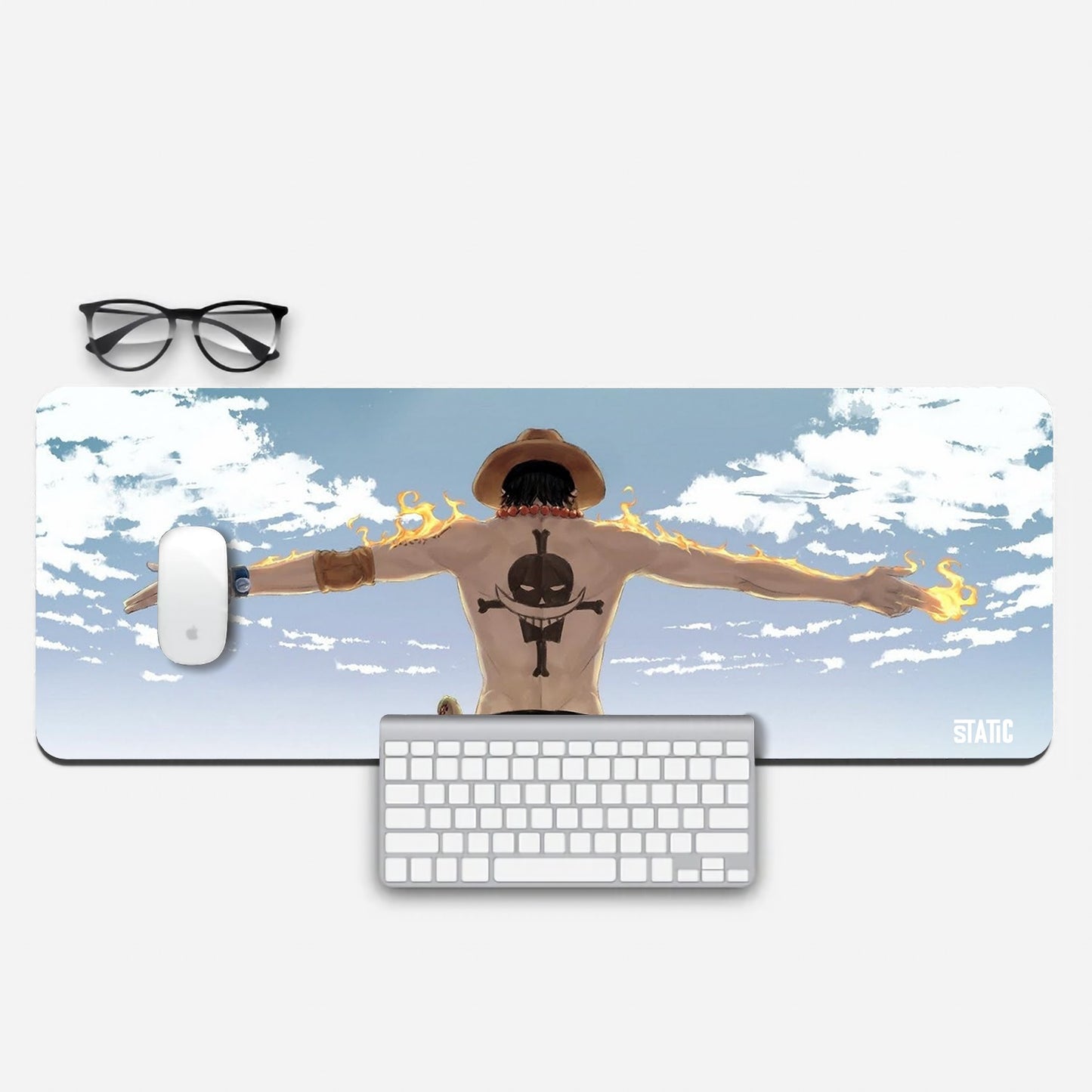 Fuel your gaming fervor with our extended mouse pad featuring Ace from One Piece. This dynamic design captures Ace with blazing arms, his signature orange hat, and the Whitebeard Pirates' emblem on his back. Measuring generously for precise control, it's a must-have for gamers seeking both style and performance. Dive into the world of One Piece – order yours now and let Ace ignite your gaming prowess!