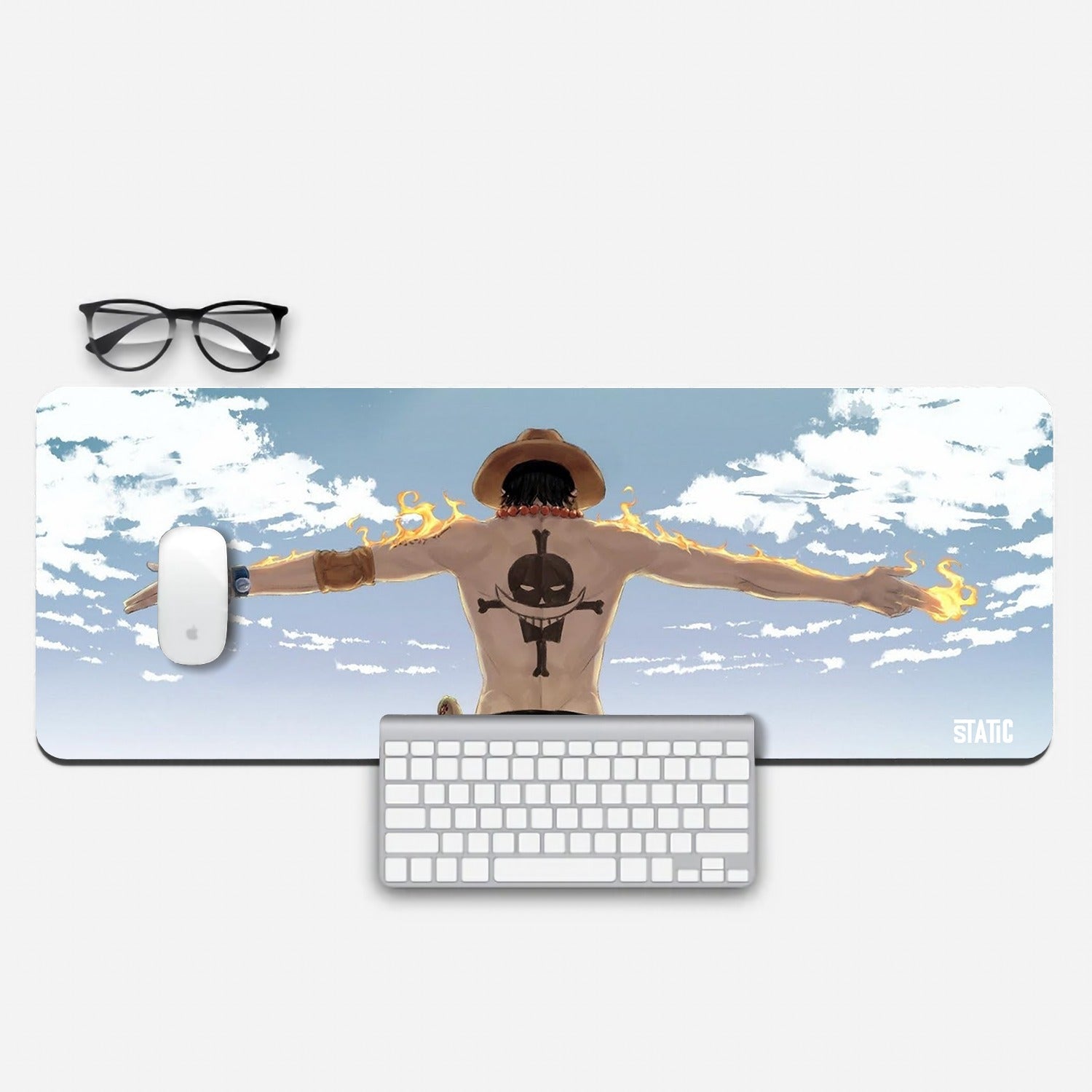 Fuel your gaming fervor with our extended mouse pad featuring Ace from One Piece. This dynamic design captures Ace with blazing arms, his signature orange hat, and the Whitebeard Pirates' emblem on his back. Measuring generously for precise control, it's a must-have for gamers seeking both style and performance. Dive into the world of One Piece – order yours now and let Ace ignite your gaming prowess!