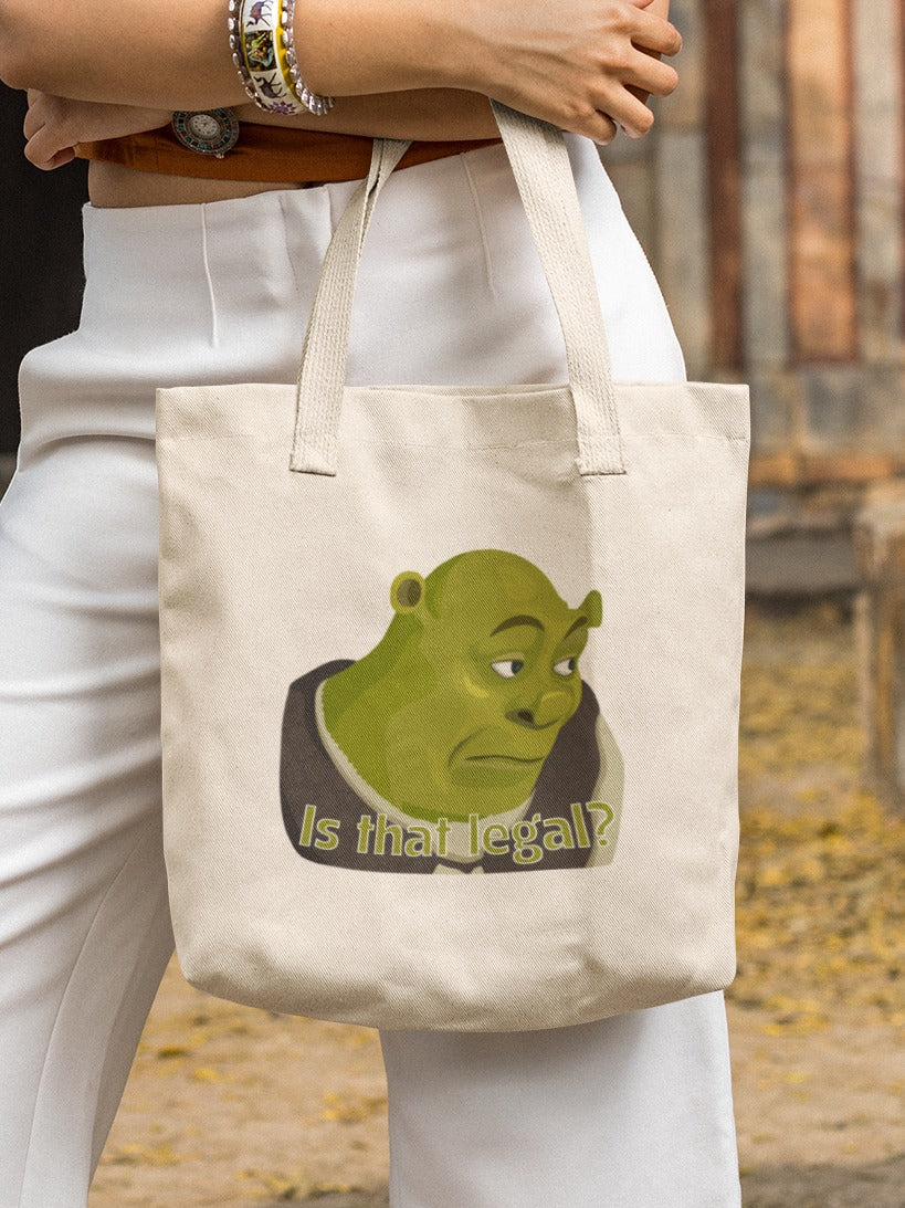 woman holding a canvas tote bag with picture of Shrek asking "is that legal?" printed on it, environmental memes