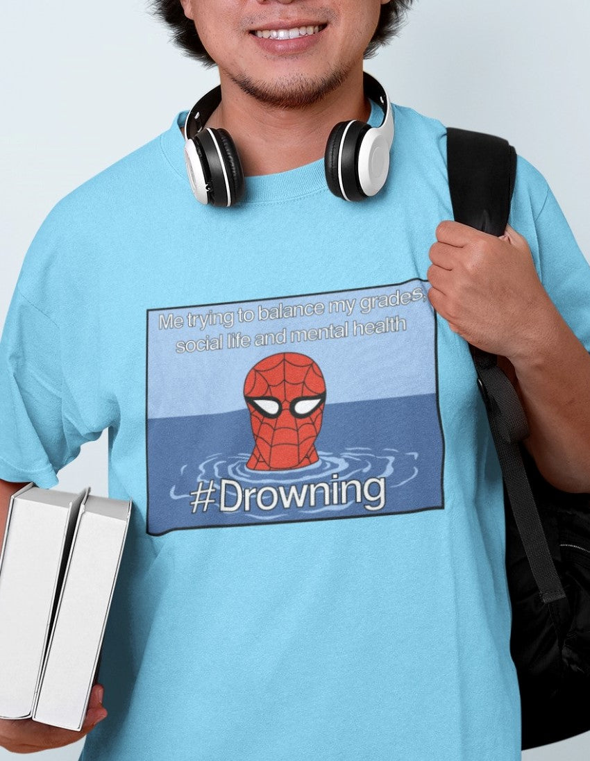 Embrace relatable humor with our Light Blue Cotton T-shirt. It showcases a meme of Spider-Man in a drowning pose, humorously depicting the struggle to balance grades, social life, and health. The caption, "Me trying to balance my grades, social life, and health #Drowning," adds a playful touch. Crafted from high-quality cotton, this tee offers both comfort and a dose of everyday humor – perfect for sparking conversations and lightening the mood. Don't miss out on this relatable addition to your wardrobe!