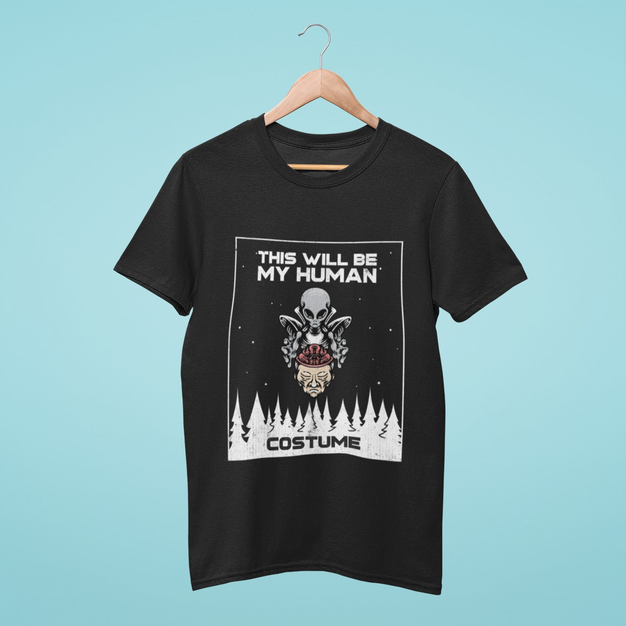 Take your style to the cosmos with our black t-shirt featuring an alien holding a man's head and the quote "This will be my human costume". Perfect for sci-fi enthusiasts and those who love edgy fashion. Made from high-quality materials, this comfortable and durable t-shirt is a must-have. Order now and add some intergalactic charm to your wardrobe!