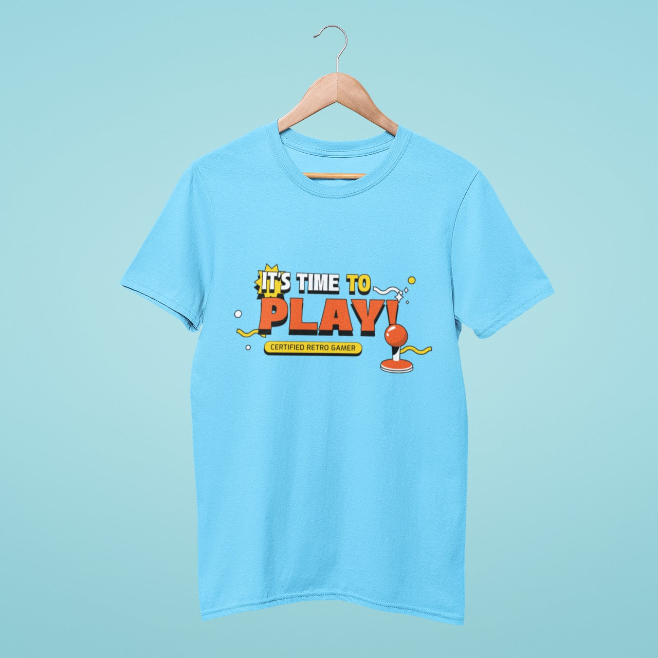 Get ready to play with our 'It's Time to Play' blue t-shirt featuring a classic joystick design. Show off your gaming skills and proclaim yourself a 'Certified Retro Gamer' in style. Level up your wardrobe with this retro-inspired tee!
