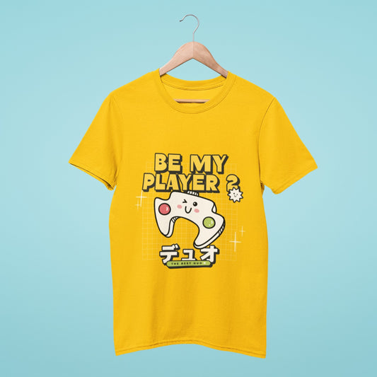 This yellow t-shirt is the perfect way to find your Player 2! With a cute winking joystick and the Japanese word for duo, it's clear that you're looking for a gaming partner. The slogan "Be my Player 2" adds a playful touch, and the small text "The Best Duo" reinforces the message.