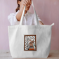 Peacock on a branch large tote bag Everyday Large Tote Bag by Antara Verma