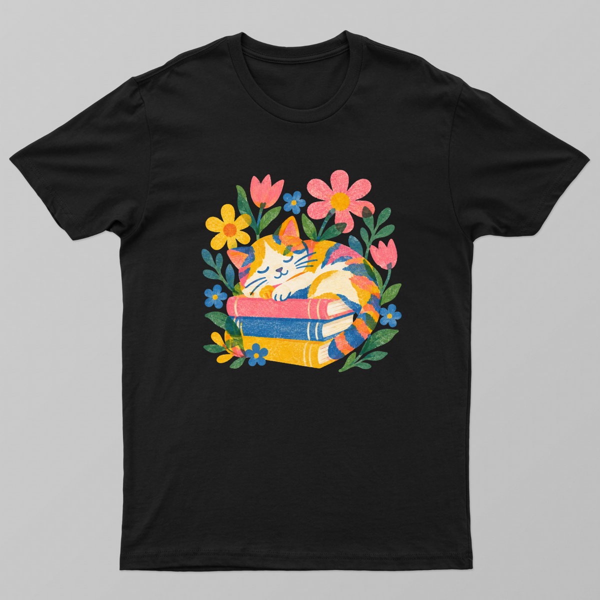 Bookish Cat Sleeping on Stack of Books Floral Graphic Tee Unisex T-shirt by SeJaa_Studio