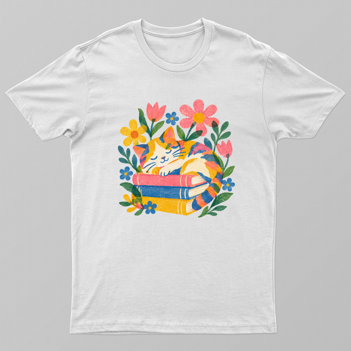 Bookish Cat Sleeping on Stack of Books Floral Graphic Tee Unisex T-shirt by SeJaa_Studio