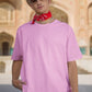 Baby Pink T-Shirt - Premium Heavyweight 240 GSM Oversized Fit
In this striking image, a confident and stylish guy dons our Premium Heavyweight Baby Pink Oversized Tee, exuding effortless cool. He elevates the look with a vibrant red bandana stylishly tied around his neck, adding a dash of attitude. Fashionable shades protect his eyes, and a trendy hat completes the ensemble. His outfit harmoniously blends comfort and flair, making a bold and memorable fashion statement.