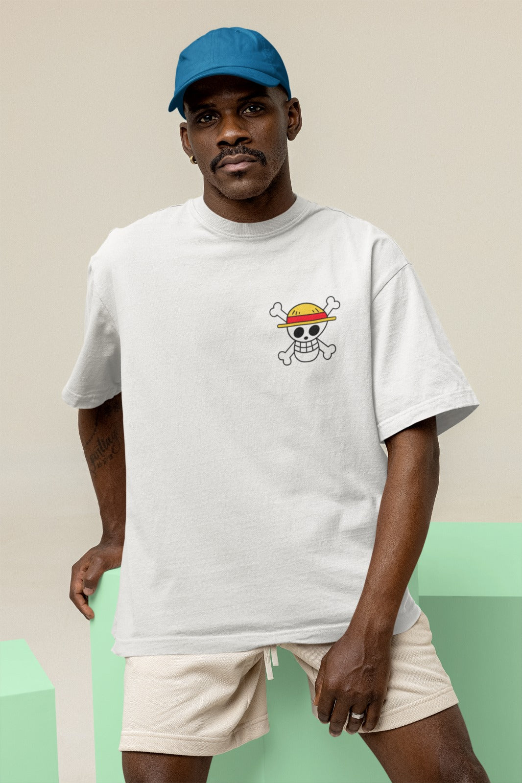  Elevate your anime fashion game with our white oversized t-shirt. It showcases the Straw Hat Pirate Crew Jolly Roger design from One Piece on the front, while featuring a vibrant portrayal of Monkey D. Luffy in his formidable Gear 5 form, laughing, on the back. Crafted with premium materials, this trendy tee is a must-have for any One Piece enthusiast. Make a bold statement and embrace your inner pirate today!