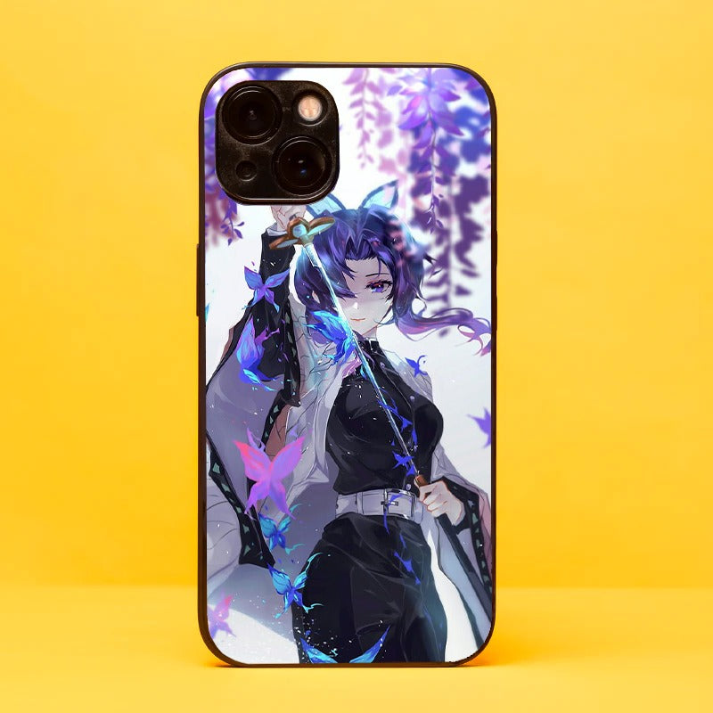 Protect your iPhone and OnePlus in style with our glass phone cover featuring Shinobu from Demon Slayer in action, surrounded by lavender leaves and butterflies. Crafted with premium materials, this captivating design showcases the elegance and deadly skills of the Insect Hashira. Elevate your phone's look and pay homage to Shinobu's character with this unique and powerful glass phone cover. Shop now and embrace the world of Demon Slayer!