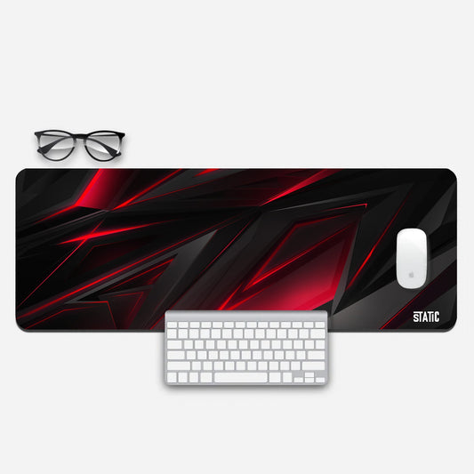 Elevate your gaming station with our Extended Gaming Mouse Pad featuring a captivating abstract design. Futuristic red strokes against a sleek metallic black background exude a sense of modernity and style. Measuring 800x300mm, it provides ample space for precise control, and its skid-proof backing ensures stability. Upgrade your gaming experience with this unique and eye-catching mouse pad.