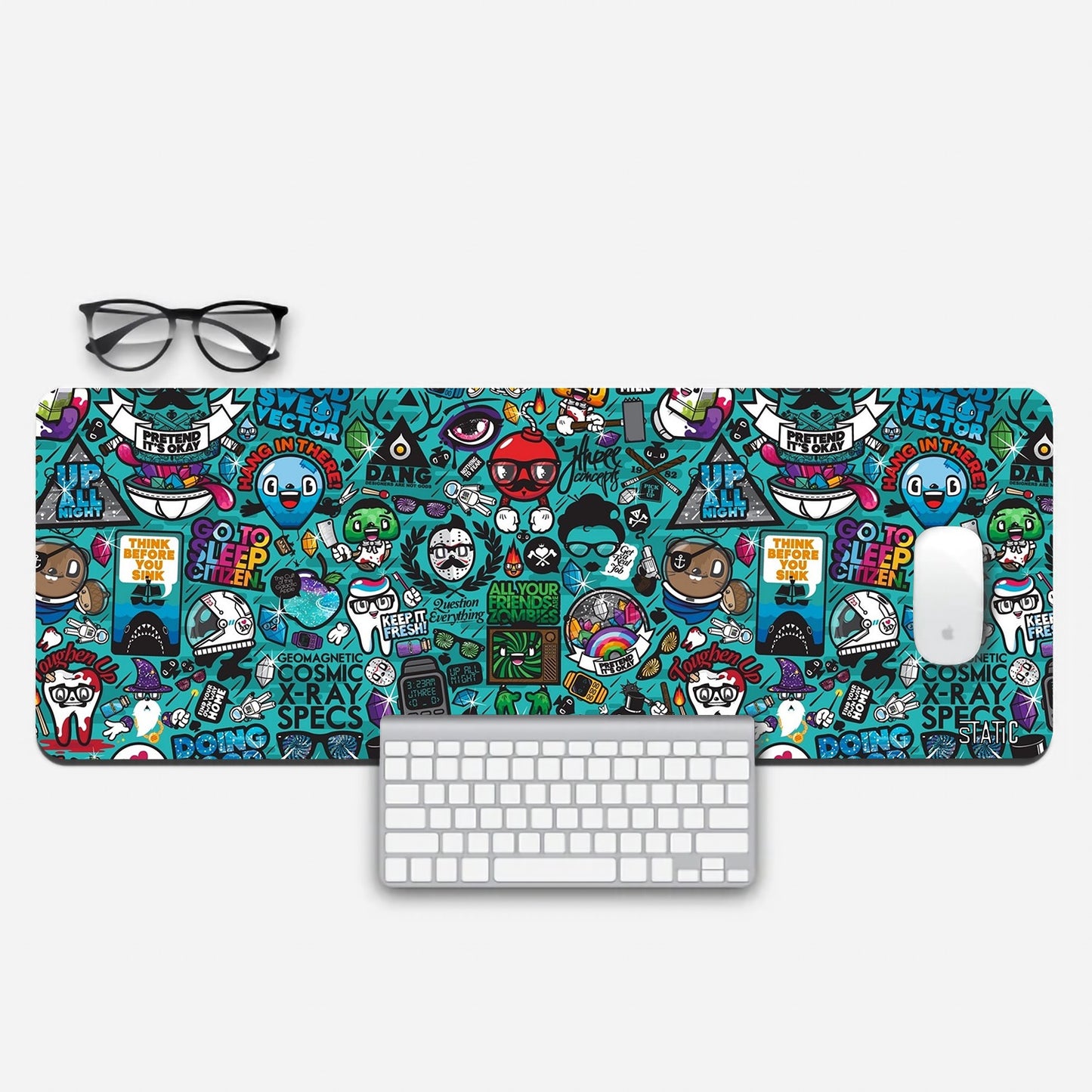 Elevate your gaming experience with our Extended Gaming Mouse Pad, featuring a captivating collage of random doodles, inspiring quotes, and quirky cartoon characters. Measuring 800x300mm, it offers ample space for precise mouse control while adding a touch of whimsy to your gaming setup. The skid-proof backing ensures stability during intense gameplay. Level up your gaming style and motivation with this unique and functional mouse pad.