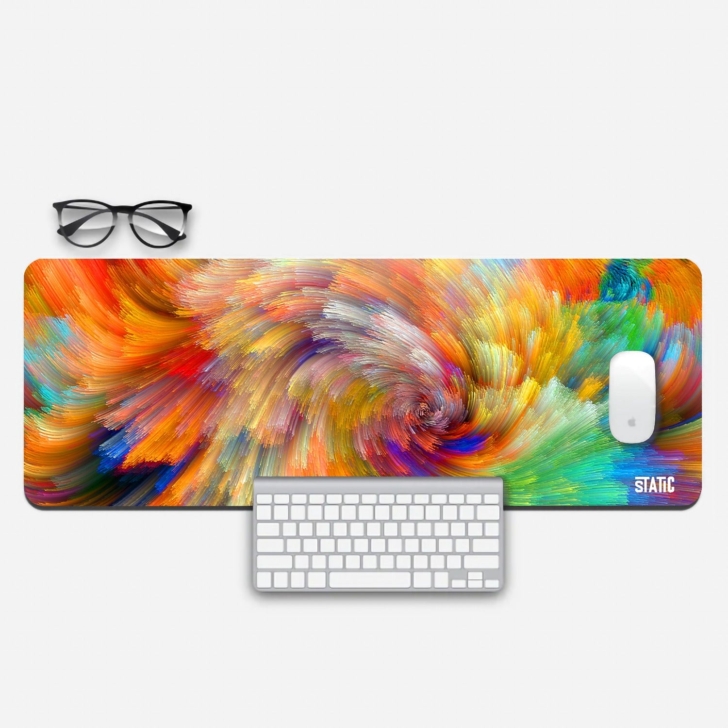 Dive into a world of vibrant creativity with our Extended Gaming Mouse Pad, showcasing 'Festival of Colours.' This abstract digital artwork features a mesmerizing swirl of vivid hues, adding an artistic flair to your gaming setup. Sized at 800x300mm with a non-slip backing, it provides precision and stability for your gaming endeavors. Elevate your gaming experience with this burst of colors – where art and performance unite.