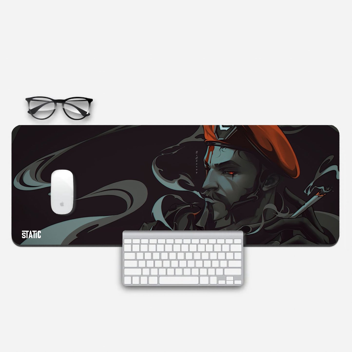 Elevate your gaming experience with our Extended Gaming Mouse Pad featuring Brimstone from Valorant. Dive into the action as Brimstone stands surrounded by swirling grey vapors, his iconic hat glowing warm red, and his eyes emitting the same fiery hue. Sized at 800x300mm, this mouse pad offers precision and style. Upgrade your setup with this premium gaming accessory. Get yours today!