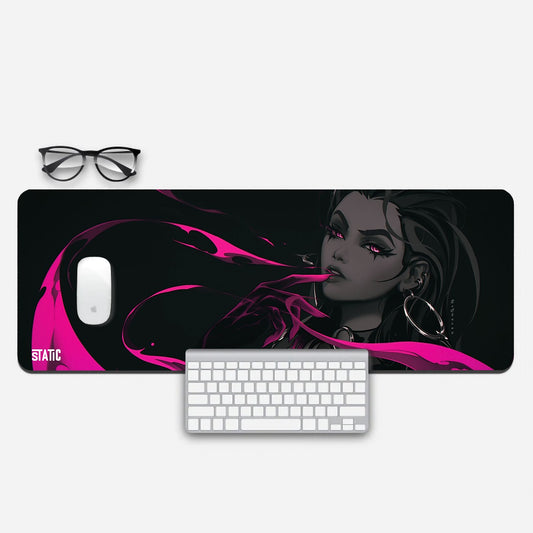 Dive into the world of Valorant with our Extended Gaming Mouse Pad featuring Reyna, bathed in vibrant pink radiance. This premium pad offers ample space for precise gameplay and adds a touch of Valorant flair to your setup. Elevate your gaming experience with Reyna's powerful presence. Unleash your skills, secure your victories, and immerse yourself in the game like never before.
