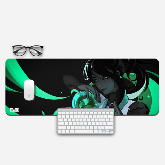 Elevate your gaming experience with our Extended Gaming Mouse Pad featuring Sage from Valorant. Immerse yourself in Sage's mystical world as she holds a vibrant green orb, surrounded by her signature green streaks and glowing emerald eyes. This high-quality mouse pad offers precision and style, making it a must-have for Valorant fans. Enhance your gameplay and add a touch of Sage's magic to your setup. Upgrade to victory today!