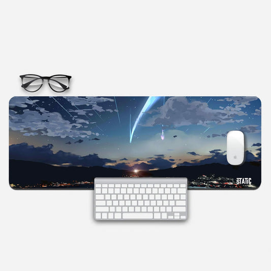 Elevate Your Gaming Experience with Our 'Your Name' Extended Mouse Pad! Immerse yourself in the iconic 'Your Name' meteor scene as a shooting star streaks across the skyline on this precision gaming mouse pad. Crafted for comfort and style, it's a must-have for fans of the movie. Enhance your gameplay and add cinematic flair to your setup. Bring the 'Your Name' magic to your desk today!