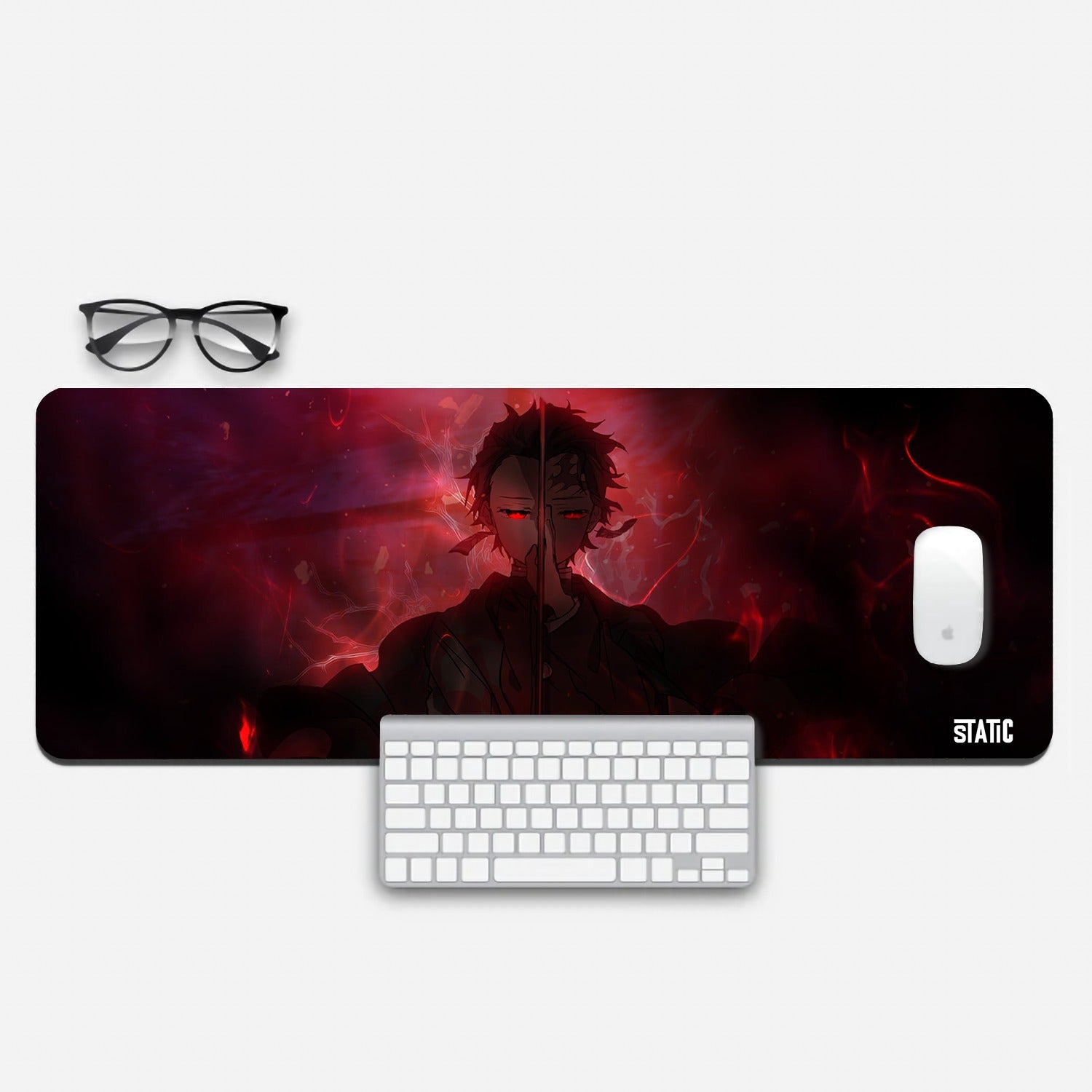Experience the electrifying world of Demon Slayer with our extended gaming mouse pad. Featuring Tanjiro Kamado in full battle mode, his sword raised and eyes ablaze with red intensity. Red sparks and lightning backdrop amplify the thrill. Enhance your gaming precision and immerse yourself in the world of Demon Slayer. Order now to wield Tanjiro's power in your gaming battles.