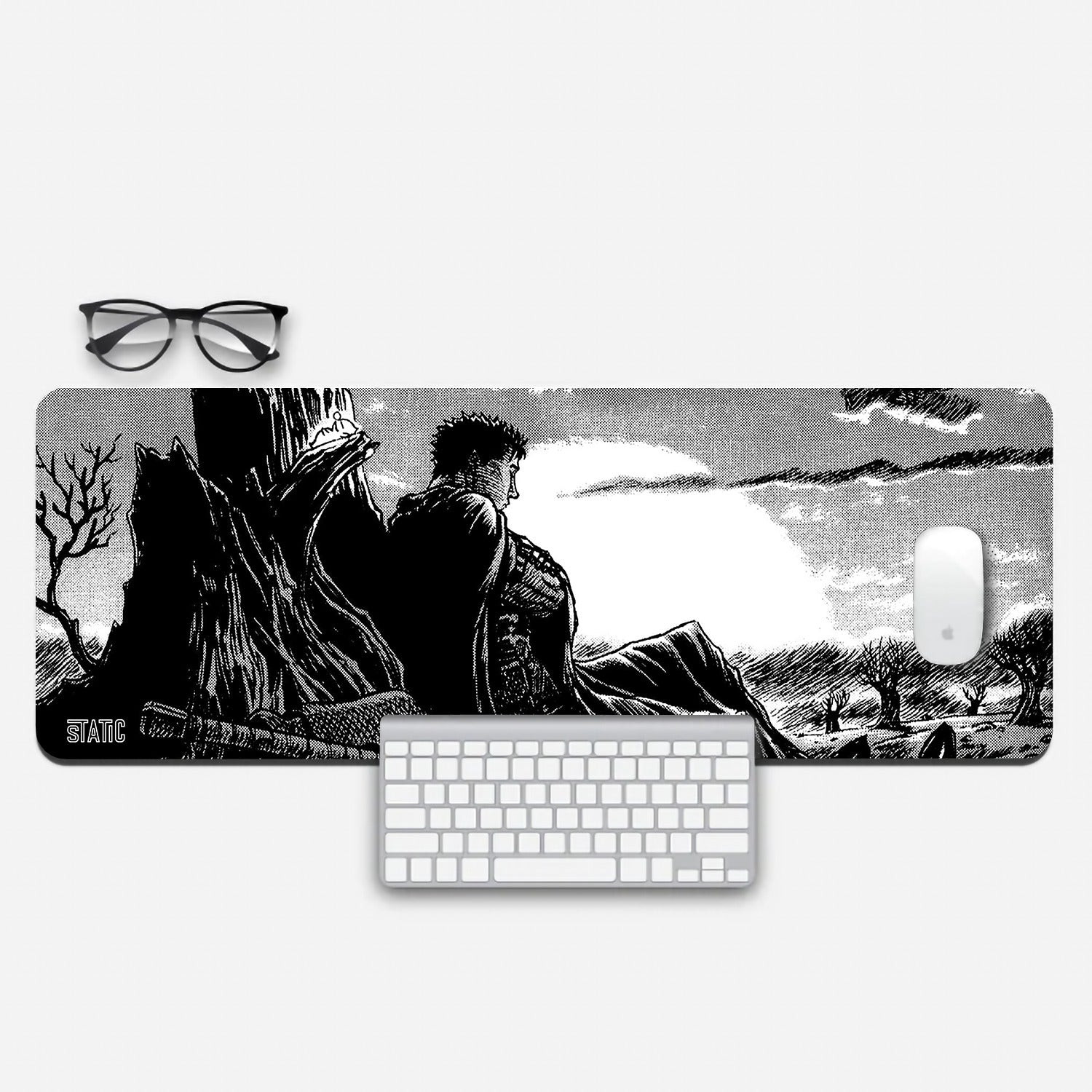 Experience the relentless world of Berserk with our extended gaming mouse pad. This captivating black and white design features Guts, the Black Swordsman, seated against a broken tree stump, framed by a haunting forest and a setting sun on the horizon. Immerse yourself in the dark fantasy and enhance your gaming precision and control. Order now and join Guts on his quest for vengeance and survival in the ruthless world of Berserk.