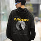 Unleash your inner wild with our Black Oversized Hoodie. Featuring a captivating moonlit design, a howling wolf silhouette embodies untamed freedom. "MOON" stands boldly in yellow, channeling ancient wisdom. This hoodie is not just clothing; it's an expression of your wild spirit. Embrace the call of the night with this stylish statement piece.