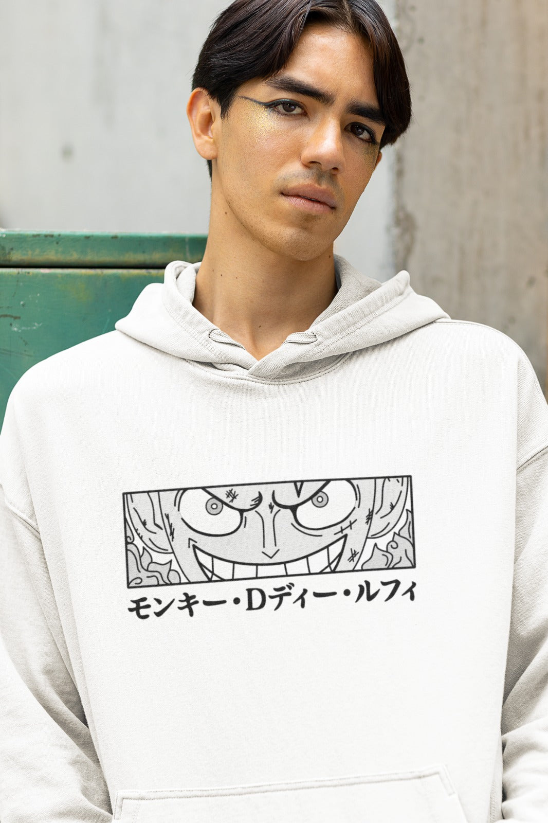 Elevate your anime collection with our White Monkey D. Luffy Oversized Hoodie. On the front, you'll find a captivating graphic design featuring Luffy's determined half-face with a cheerful smile, complemented by his name in bold Japanese characters. This hoodie is perfect for fans of One Piece, combining comfort and style while showcasing your admiration for the iconic Monkey D. Luffy. Embrace the world of pirates with this unique and cozy hoodie.