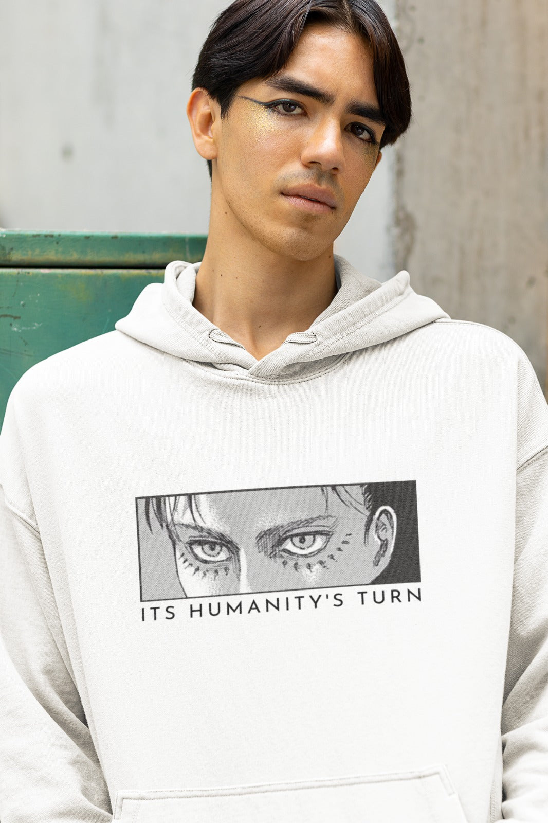 Elevate your style with our White Eren Yeager Oversized Hoodie. This hoodie features a captivating half-face graphic of Eren Yaeger from Attack on Titan, accompanied by the bold caption, "It's humanity's turn." Crafted with care and attention to detail, it's a must-have for fans of this epic series. Express your connection to the battle for humanity in style and comfort. Join the quest with this exclusive oversized hoodie.