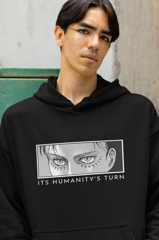 Embrace the power of Attack on Titan with our Black Oversized Hoodie. Featuring a striking half-face graphic of Eren Yeager and the bold caption, "It's Humanity's Turn." Crafted for style and comfort, this hoodie is a must-have for anime enthusiasts. Join the ranks of fans who appreciate both style and substance. Order yours today and wear your love for Eren and Attack on Titan proudly.