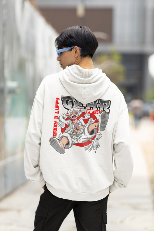Indulge in anime vibes with our White Oversized Hoodie, echoing Monkey D. Luffy's Gear 5 from One Piece. Featuring Luffy on the back and a bold "Gear 5" text, it's a tribute to his strength. Complete with the Straw Hat Pirate Jolly Roger discreetly tucked in, it's a must-have for fans, signaling your membership in the crew of adventure seekers.