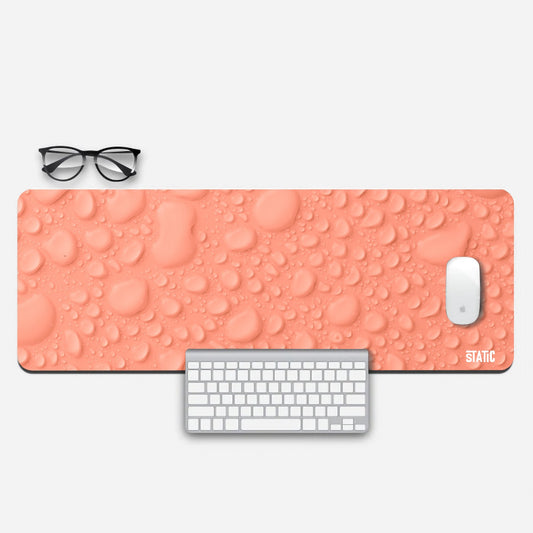Aesthetic droplets on orange Gaming Pad