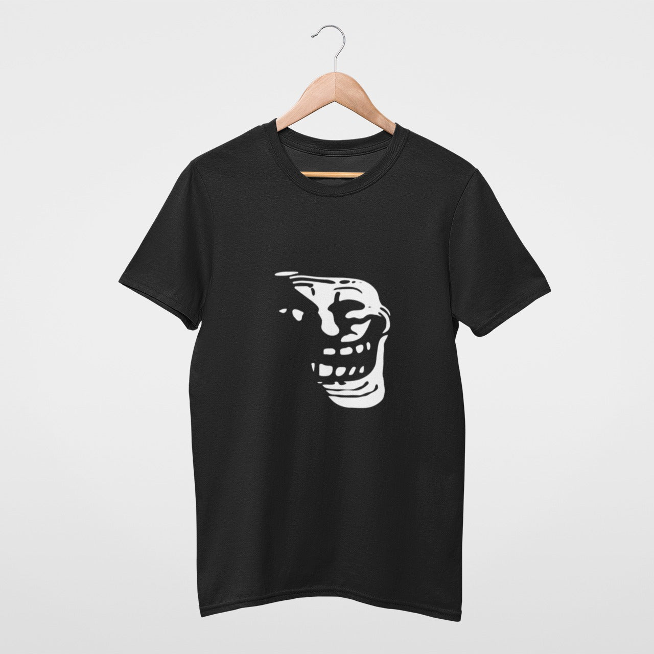 Unleash your inner troll with our vintage-inspired tee featuring the iconic laughing troll face. Perfect for those with a wicked sense of humor, this durable and comfortable shirt is a timeless nod to internet culture. Express your playful side and keep them guessing with this classic piece. Order now!