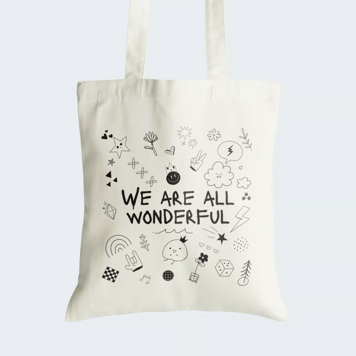 Elevate your style and embrace self-love with our "We Are All Wonderful" Cotton Canvas Tote Bag. This charming tote is adorned with adorable and childlike doodles, accompanied by the empowering caption "We Are All Wonderful." Crafted for both durability and style, it includes a secure zipper closure for daily convenience. Carry this heartwarming message of self-acceptance with our fashionable Cotton Canvas Tote Bag. Order yours today and celebrate your uniqueness!