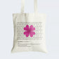 Elevate your style and celebrate serendipity with our "Serendipity Blossom" Cotton Canvas Tote Bag. This tote features "Serendipity" elegantly written five times, accompanied by a pink flower boasting heart-shaped petals. Beneath, discover a dictionary-like definition of "Serendipity," honoring the magic of unexpected moments. Crafted for style and durability, it includes a secure zipper closure for daily convenience. Carry serendipity's charm with our fashionable Tote Bag. Order yours today!