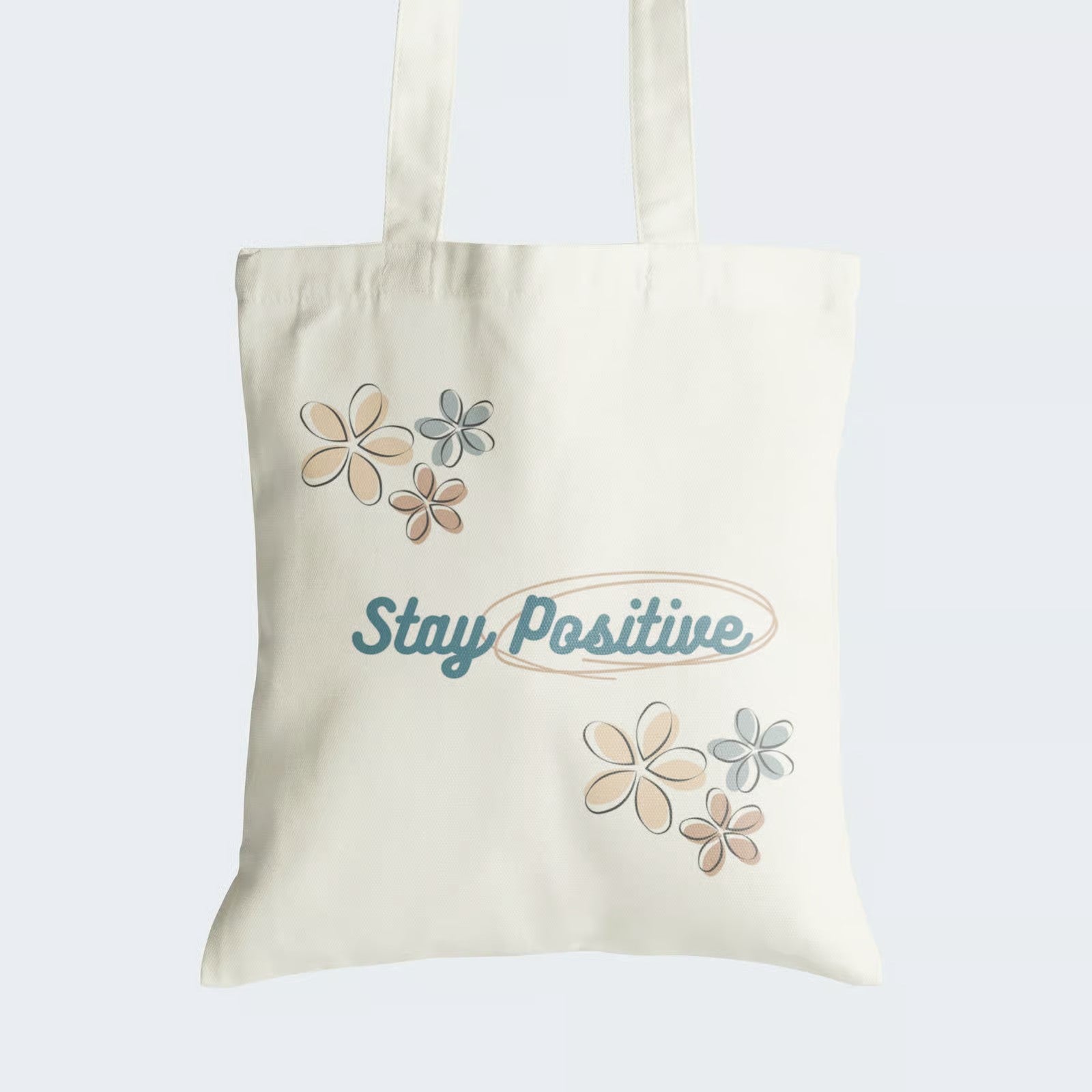 Elevate your style and uplift your spirits with our "Stay Positive" Cotton Canvas Tote Bag. This tote showcases an elegant cursive caption, "Stay Positive," enveloped in a beautifully hand-drawn circle, highlighting the importance of optimism. Crafted for both durability and style, it includes a secure zipper closure for daily convenience. Carry the message of positivity and radiate good vibes with our stylish Cotton Canvas Tote Bag. Order yours today and stay inspired!