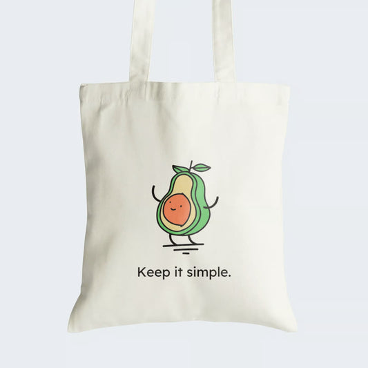Elevate your style with our "Keep it Simple" Cotton Canvas Tote Bag, a whimsical work of art. This tote features a charming graphic design of a half avocado with arms, legs, and a joyful smile on its seed, capturing the essence of simplicity. Crafted for durability and style, it includes a secure zipper closure for daily convenience. Carry the message of embracing life's joys with our unique Cotton Canvas Tote Bag. Order yours today!
