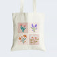  Elevate your style with our "Flower Illustrations" Cotton Canvas Tote Bag, a wearable masterpiece featuring a captivating collage of four vivid watercolor-painted flowers in diverse hues. Crafted for both durability and artistic charm, this tote boasts a secure zipper closure. It's the ideal accessory for art enthusiasts and nature lovers alike. Celebrate the beauty of botanical art and elevate your fashion game with our "Flower Illustrations" Cotton Canvas Tote Bag. Order yours today!