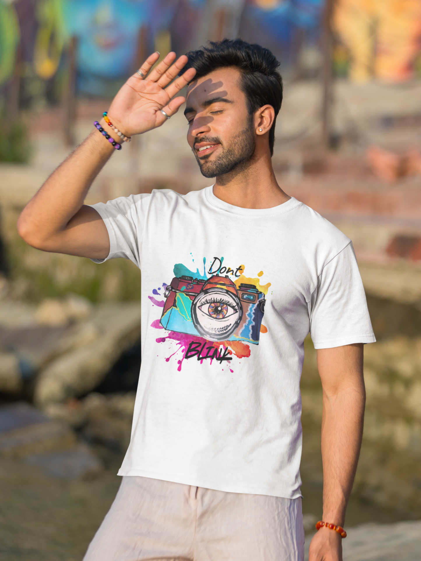 Don't blink for photographers Unisex T-shirt by @miralynadoraartworks