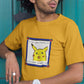 man with curly hair wearing sunglasses in front of a green door wearing a yellow tshirt with a console style photo of confused pikachu printed on it with message of "Life uses Confusion It's super effective", relatable Pokemon memes