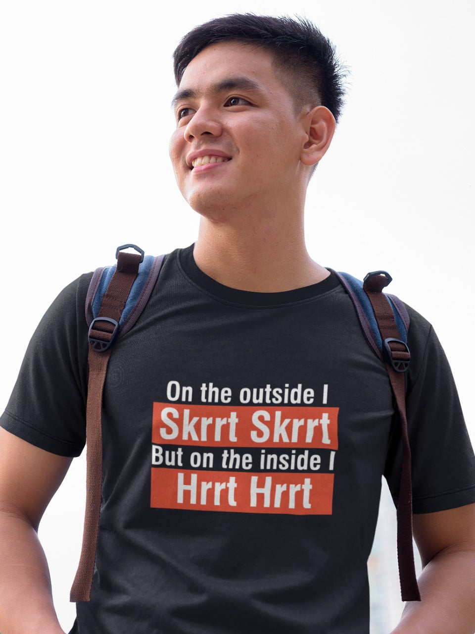Man wearing a black tshirt with message of "on the outside I skrrt skrrt but on the inside I hrrt hrrt" printed on it, relatable funny memes