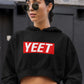 girl wearing black golden shades and a black crop hoodie with yeet written on it in red colour, cool internet memes