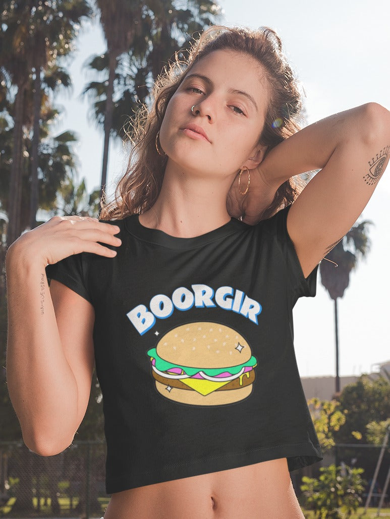 girl with nose ring and earrings wearing a black crop top with a burger design and boogie written on it