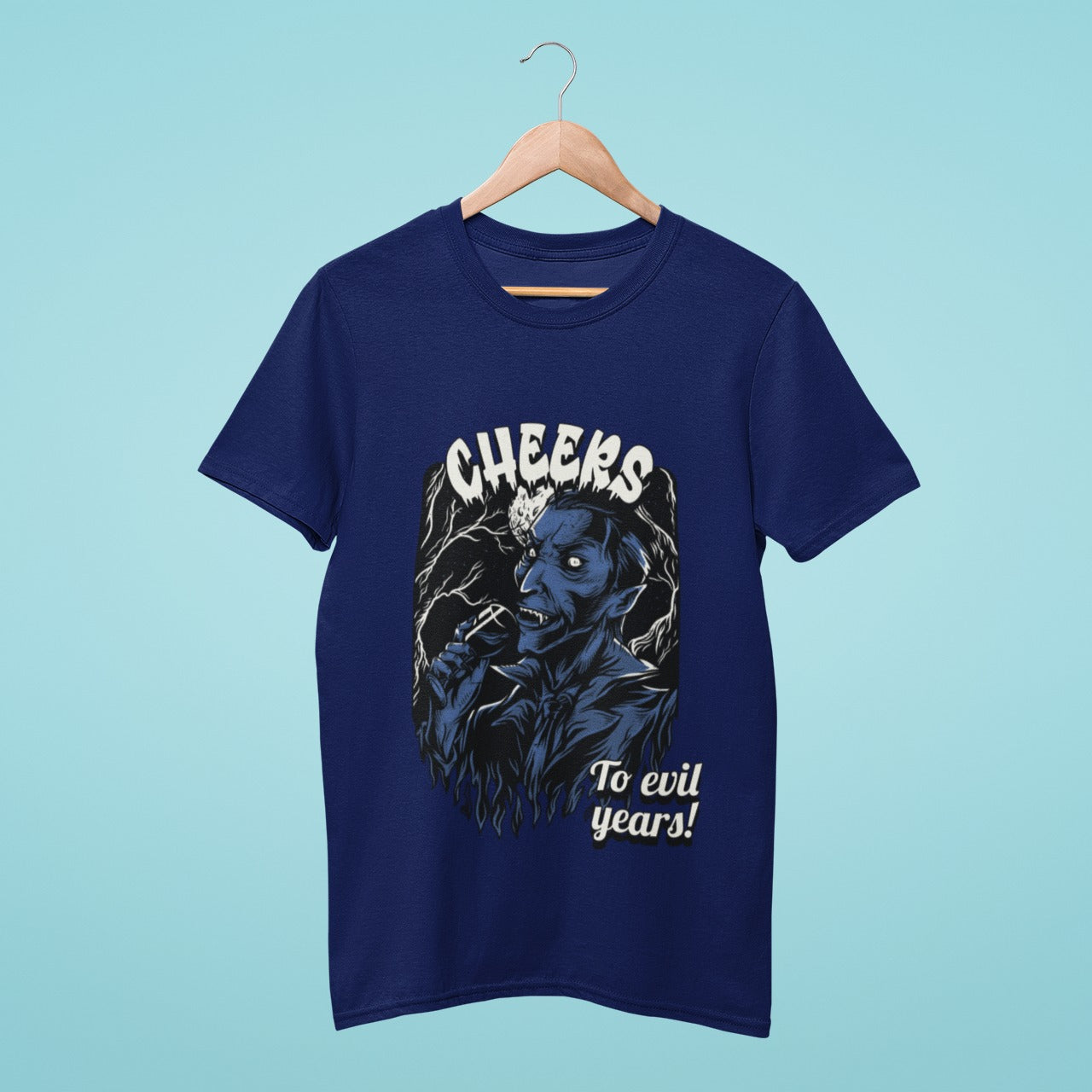 Raise your glass to the wicked with our navy blue t-shirt featuring the "Cheers to Evil Years" slogan and a graphic of a stylish vampire indulging in a sip from his wine glass. Perfect for Halloween or any gothic occasion, this tee is a must-have for all those who love to embrace their darker side. Get yours now and toast to the spooky season in style!