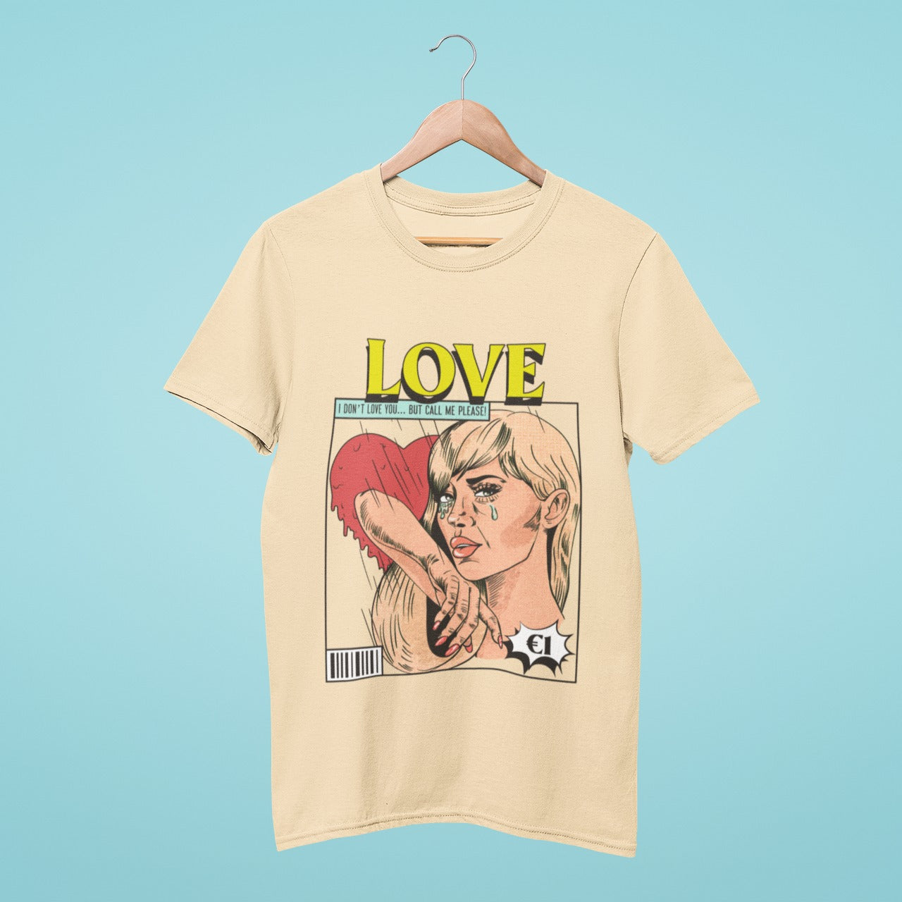 Looking for a vintage touch? This beige t-shirt features a striking image of a crying woman holding a bleeding heart, all while the word "love" is boldly written. The design perfectly captures the bittersweet nature of love and heartbreak, making it a must-have for anyone who appreciates vintage art.