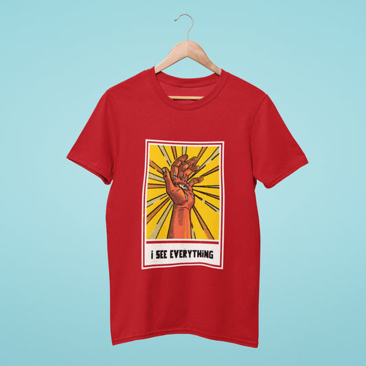 See everything with this bold red t-shirt featuring an eye and hand graphic. The 'I see everything' slogan is sure to turn heads and make a statement. Perfect for those who like to keep their eye on the prize.