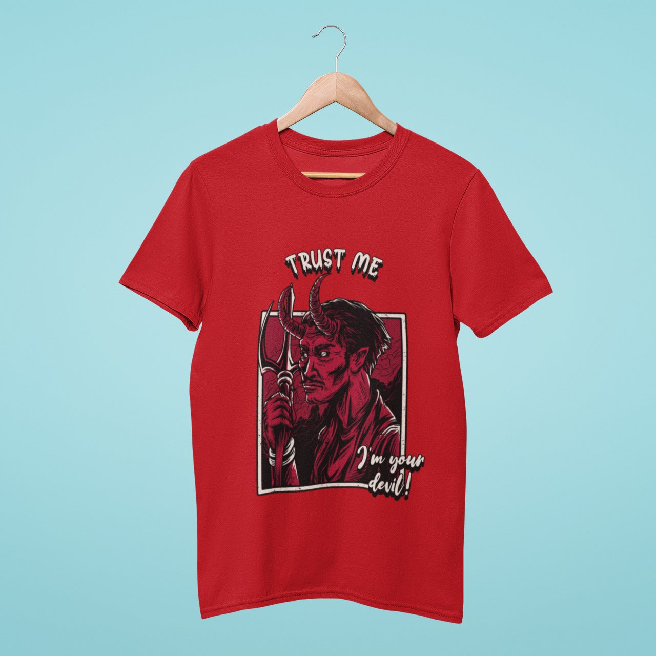 Unleash your devilish side with this bold red t-shirt featuring a graphic of the devil holding his trident and the sassy slogan "Trust Me, I'm Your Devil". Perfect for making a statement and showing off your wicked sense of humor. Get yours today!