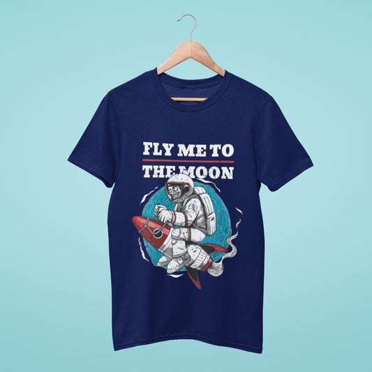 Elevate your wardrobe with our navy blue t-shirt featuring a playful astronaut sitting on a rocket, flying around the moon like a horse. The "Fly Me to the Moon" quote adds a whimsical touch to this unique and creative design. Perfect for casual outings or as a gift for space enthusiasts. Order now and showcase your love for the universe!