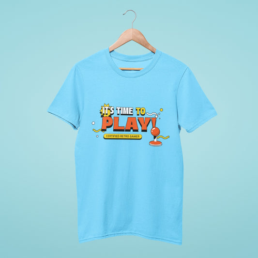 Get ready to play with our 'It's Time to Play' blue t-shirt featuring a classic joystick design. Show off your gaming skills and proclaim yourself a 'Certified Retro Gamer' in style. Level up your wardrobe with this retro-inspired tee!