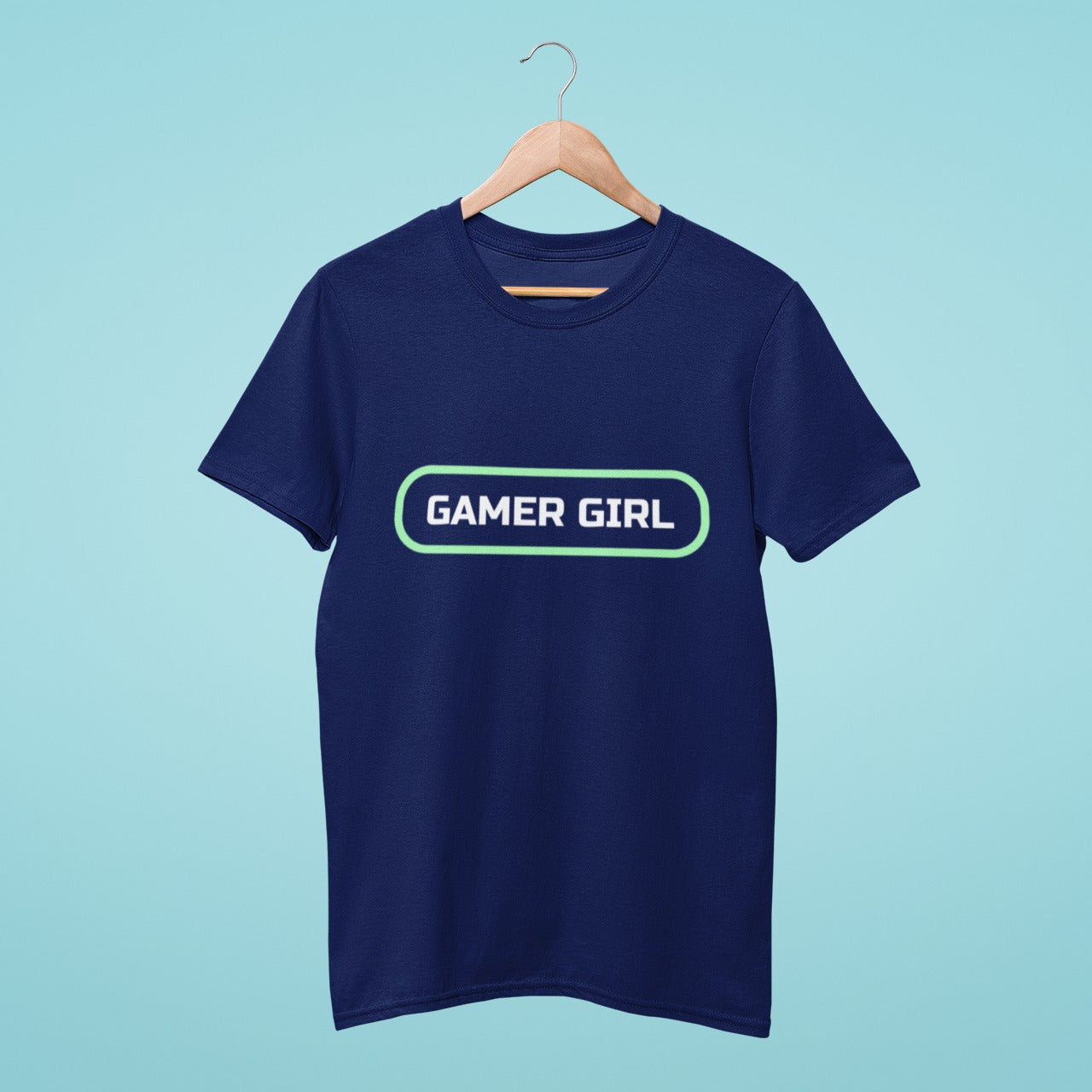 Level up your style with this navy blue t-shirt featuring 'Gamer Girl' written like a game button. Perfect for showing off your passion for gaming in a fashionable way. Get yours now!